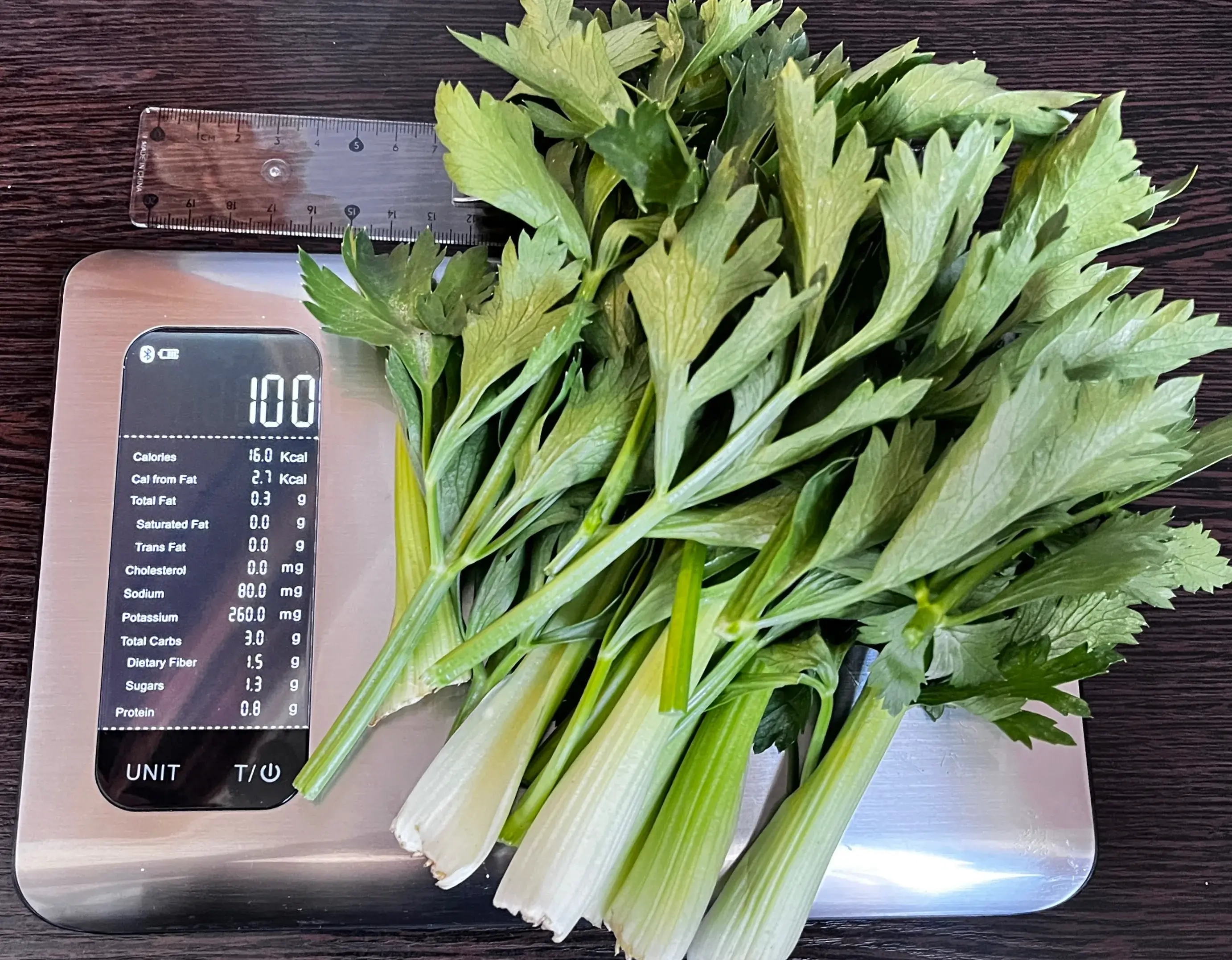 16 Calories or 100 Grams of Celery on scale